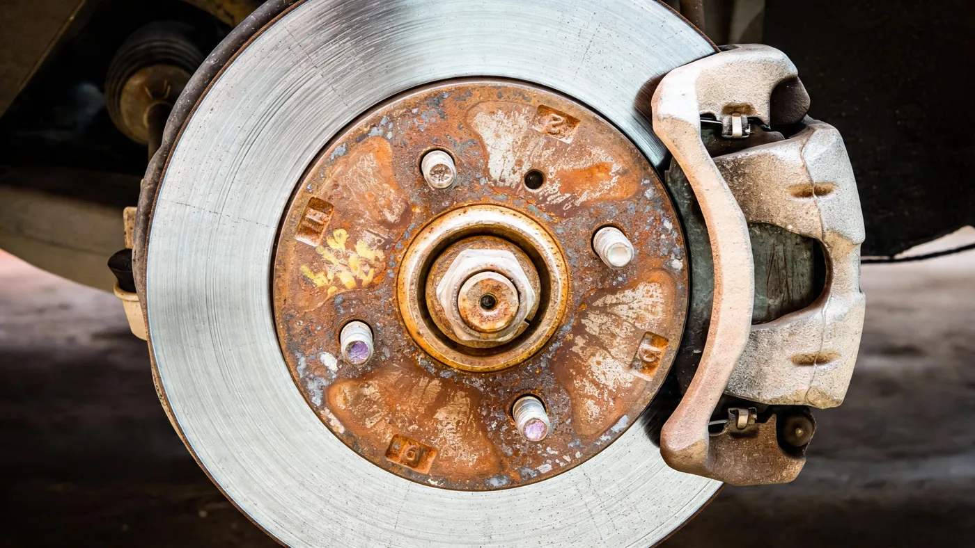 Brake caliper and disc on the car before removal